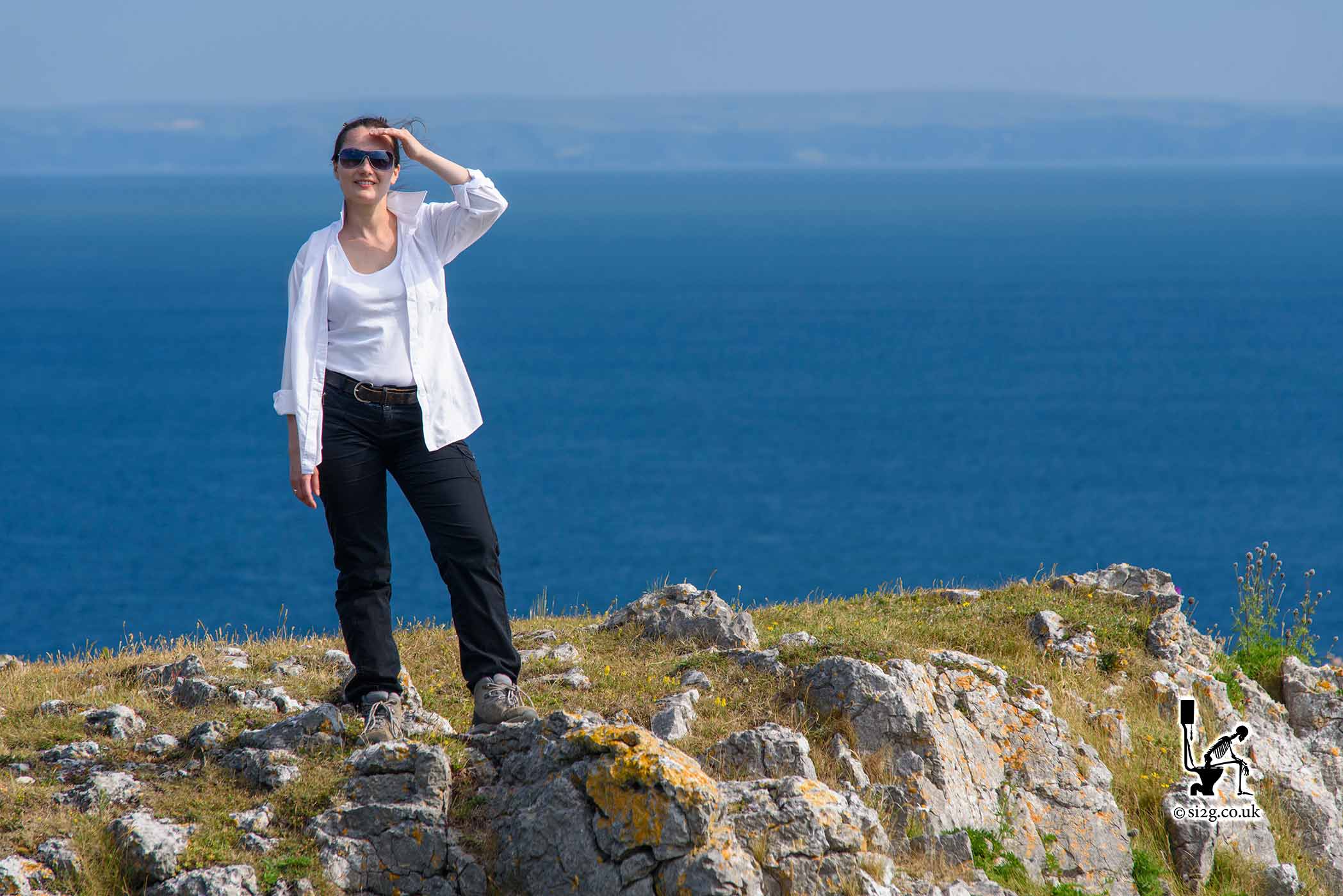 Cliff Top-Recce - Daria searches out cliff-top locations for a tourism photo shoot.  This is part of the Welsh coastal path and is a lovely location during the summer.